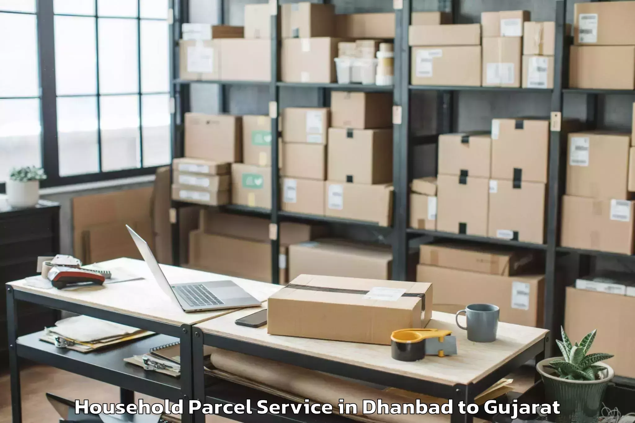 Affordable Dhanbad to Jhalod Household Parcel